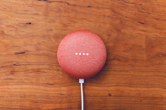 A Red Google Home Mini Speaker